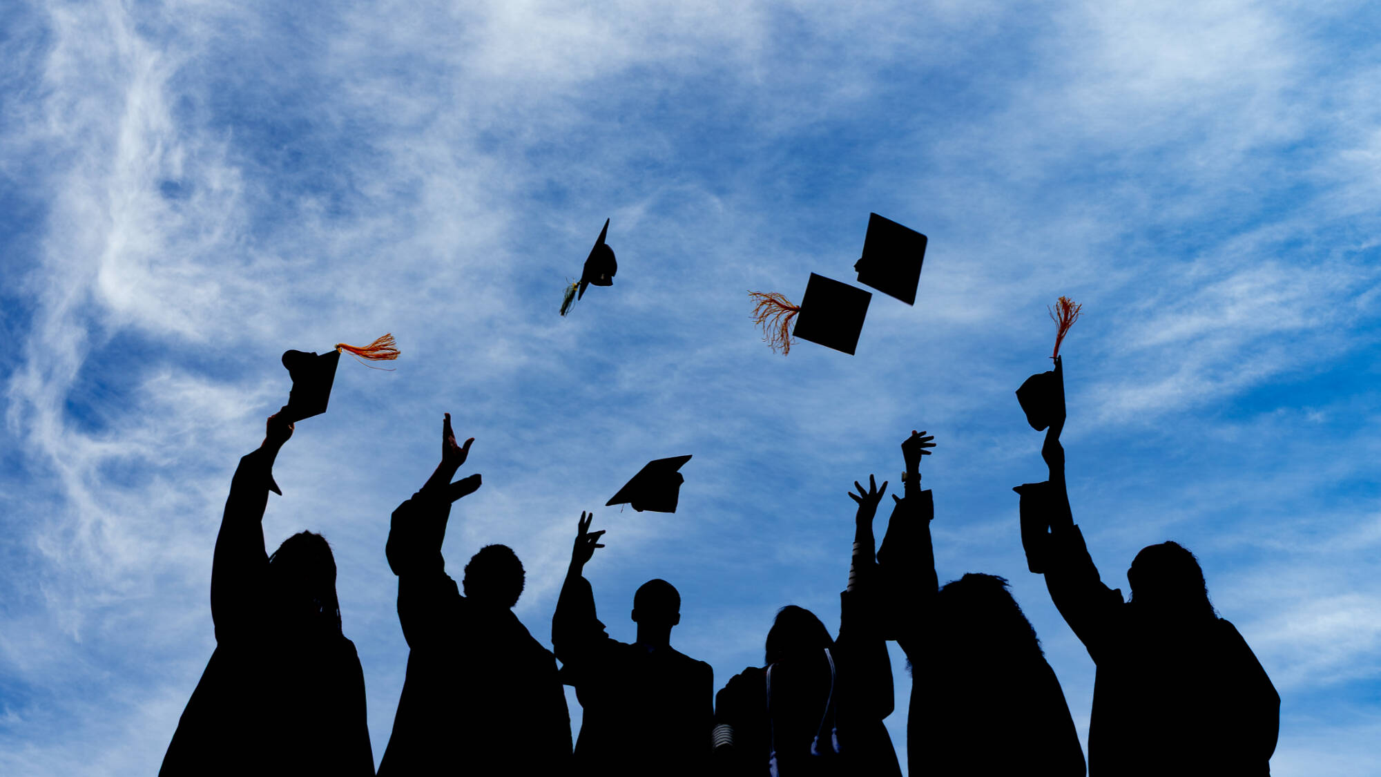 GVSU students from the HBCU consortium (from left) Quinton Randall, Kobe Rhynes, Jourdan Watson, Rashawny Alic, Darriel Wright and Skye Gerald, pose for a portrait outside the Mary Idema Pew Library on April 14.
